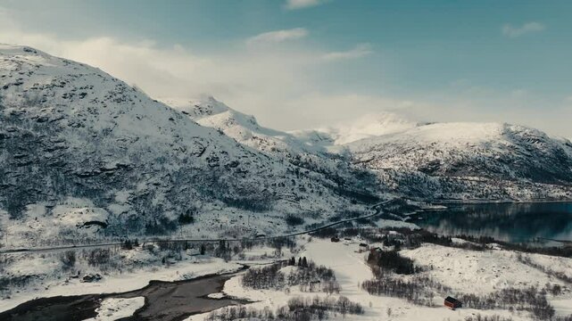 Aerial View Of Road Along The Mountain Range Covered With Snow During Winter In Lodingen, Norway.