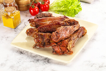 Roasted duck wings with sauce