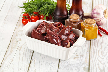 Raw chicken liver uncooked in the bowl