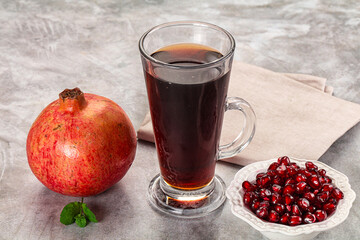 Sweet fresh pomegranate juice with fruit