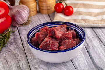 Raw beef meat cubes pieces
