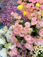 lots of different colors of spring flowers as background