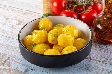 Boiled young potato with oil