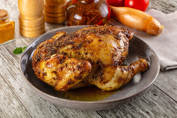 Baked in oven whole chicken with spices