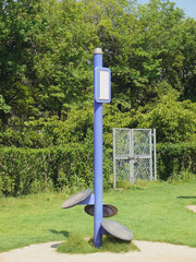 Outdoor fitness equipment installed in the open space of the public sports park.