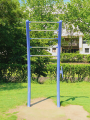 Outdoor fitness equipment installed in the open space of the public sports park.