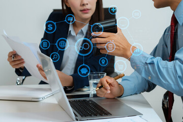 Close up Busines swoman and partner using calculator and laptop for calculation finance, tax, accounting, statistics and analytic research concept.