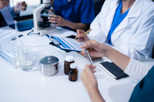 Medical team working on digital tablet healthcare doctor technology tablet using computer analyzed the results of medical reports, an online conference at the hospital.