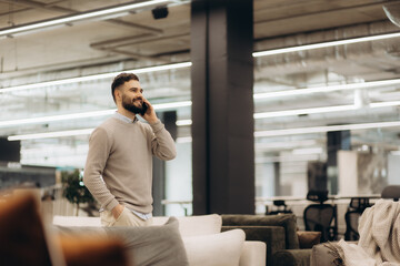 Business Professional Discussing on Phone in Modern Office Space