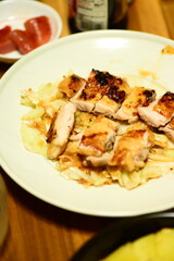 The chicken steak is moist and juicy inside.