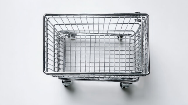 A top-down perspective of a small, empty, metal shopping cart displayed against a white background