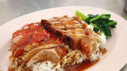 Red pork and crispy pork rice. Asian street food.