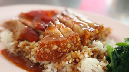 Red pork and crispy pork rice. Asian street food.