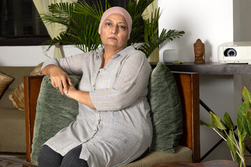 Last stage cancer woman feel bad at home. 
Indian Sad woman worrying about her health condition