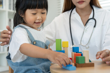 Pediatricians are checking the children development according to the appropriate age, doctors...