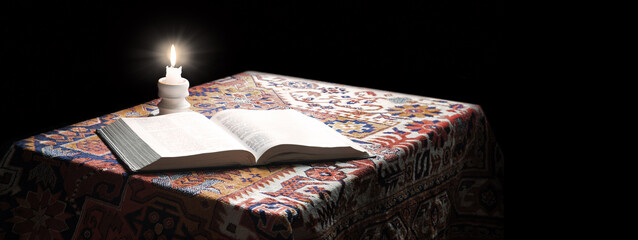 Big old bible and candle