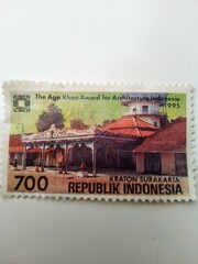 
A Collection of Colorful Indonesian Postage Stamps Arranged Closely Together

