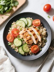 Protein-packed quinoa with fresh cucumber, tomato, and grilled chicken
