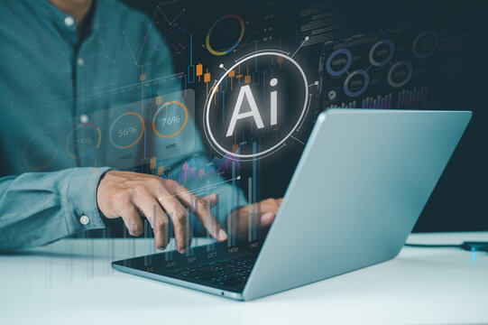 Person using a laptop with digital AI and data analytics graphics overlay, symbolizing artificial intelligence and technology integration.
