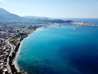 A drone photo of the beautiful bay of Bar and turquoise sea in Montenegro