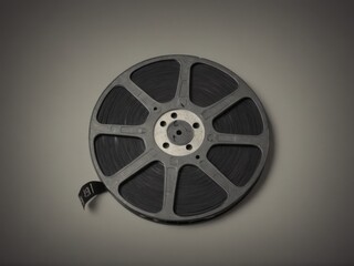 Obraz premium A vintage film reel embodies the golden era of Hollywood against a sleek gray backdrop