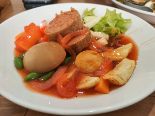 Delicious Indonesian chicken galantine, a culinary delight.
A traditional Indonesian dish...