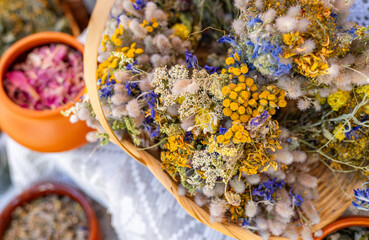 Market stall selling natural goods. Showcasing a variety of dried herbs. Traditional craftsmanship....