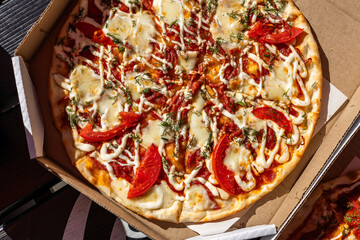 Pizza. Hawaiian Pizza. Pineapple Pizza. Pizza with pineapple, ham, onions, cheese, tomatoes, bacon,...
