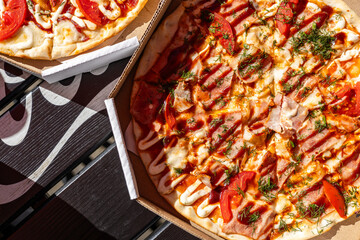 Pizza. Hawaiian Pizza. Pineapple Pizza. Pizza with pineapple, ham, onions, cheese, tomatoes, bacon,...