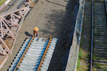 industrial engineer hard working worker rail road construction drone top view foreshortening