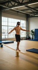 Man balances on beam, blindfolded