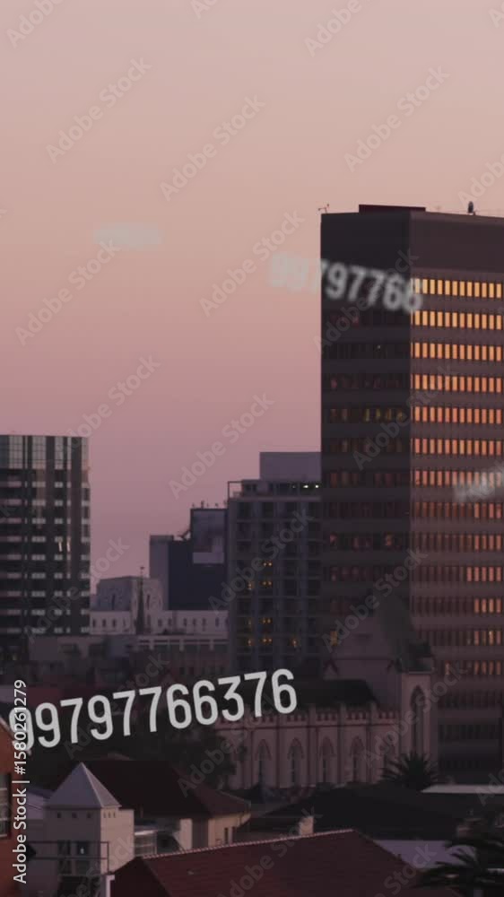Aufkleber animation of multiple changing numbers falling against aerial view of cityscape