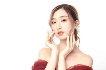 A beautiful young Asian woman with clean, fresh skin against a white background. Skincare, facial...