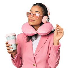 Young Filipina with chic travel accessories in pink tones