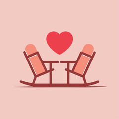 Two chairs with a heart in the middle. The chairs are blue and red. The chairs are facing each other