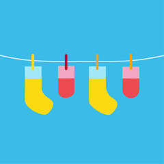 Three pairs of socks hanging on a line. The socks are of different colors and sizes. The image has a bright and cheerful mood, with the colors of the socks
