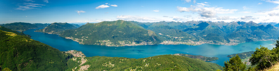 Fototapeta premium Panorama of Lake Como from above, photographed from Mount Legnoncino, with a view of the mountains and lakeside villages.