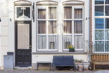 Bench in front of a historic house in Grave, Netherlands