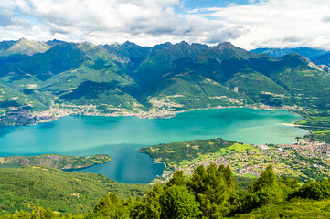 Panorama of Lake Como from above, photographed from Mount Legnoncino, with a view of the mountains and lakeside villages.