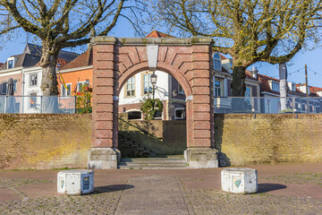 Monumental arch at the riverbank in Grave, Netherlands