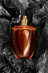 Perfume on black paper