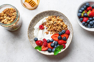 Granola bowl with greek yogurt and fresh berries