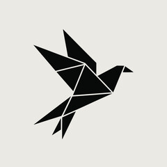 Geometric black origami bird in flight against a light gray background