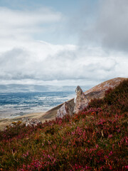Overlooking a rugged valley in Ireland, the mountains of the Coomloughra Horseshoe stretch to the...
