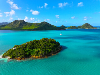 Obraz premium Antigua. West Indies. Caribs. Lesser Antilles. Atlantic Ocean. Incredible colors and views. Ocean view. Drone view. View from above. The most beautiful place in the world. Boats. Yacht.