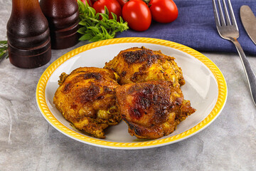 Roasted chicken thighs  with spices