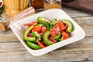 Salad with avocado and salmon