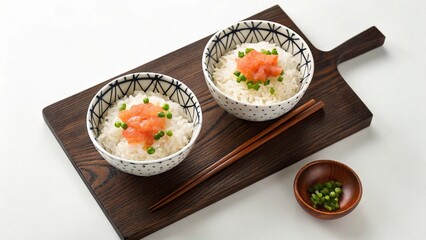 Japanese rice with salmon and green peas in a bowl on white background
