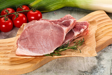 Raw pork steak loin with bone
