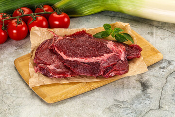 Raw beef cheeks cut for cooking